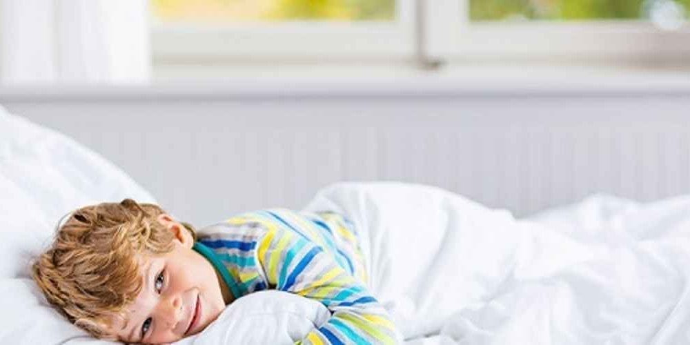 ADHD sleeping little boy in bed iStock 624086798 web900w