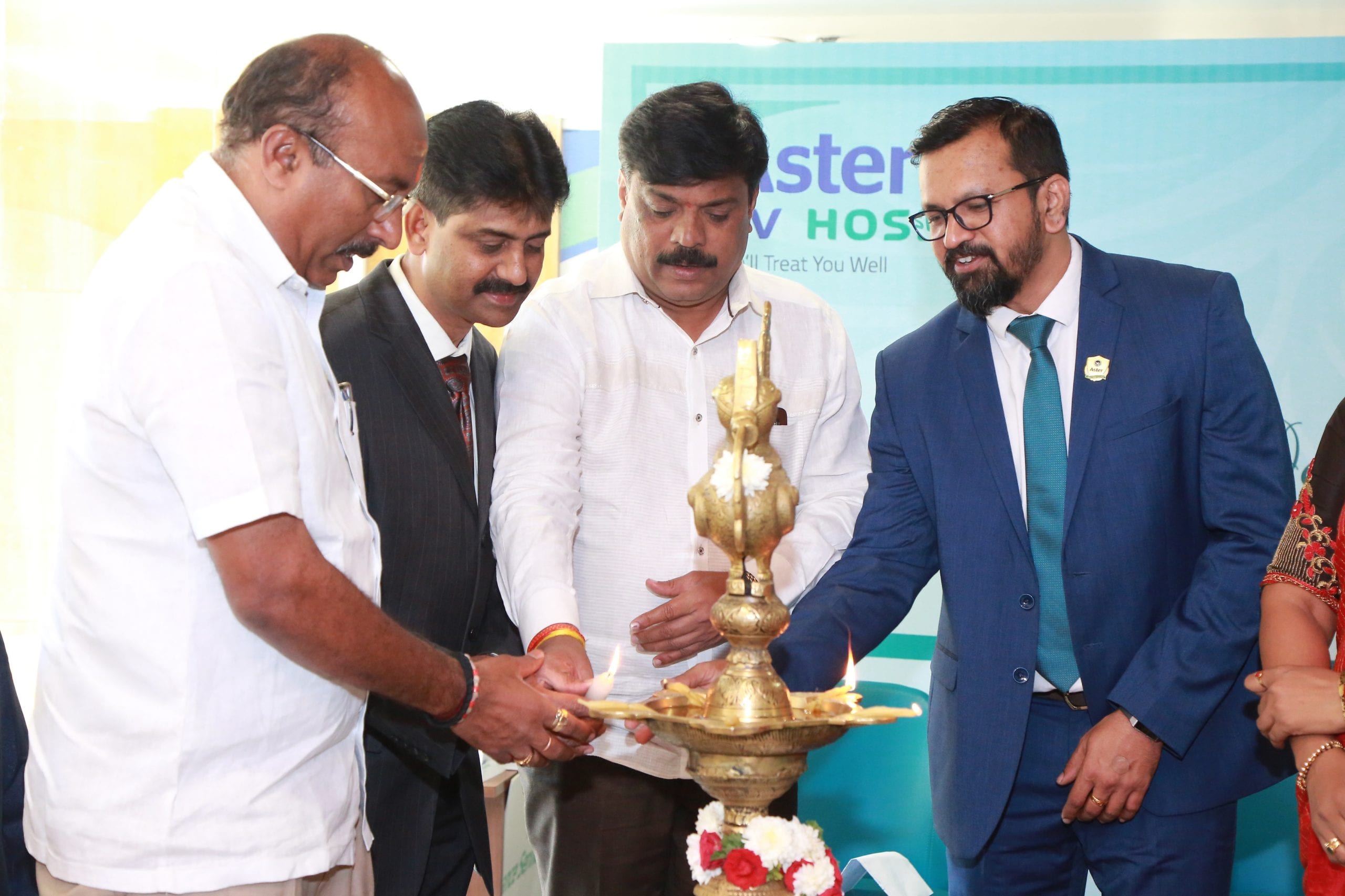 Lighting of the lamp by dignitaries scaled