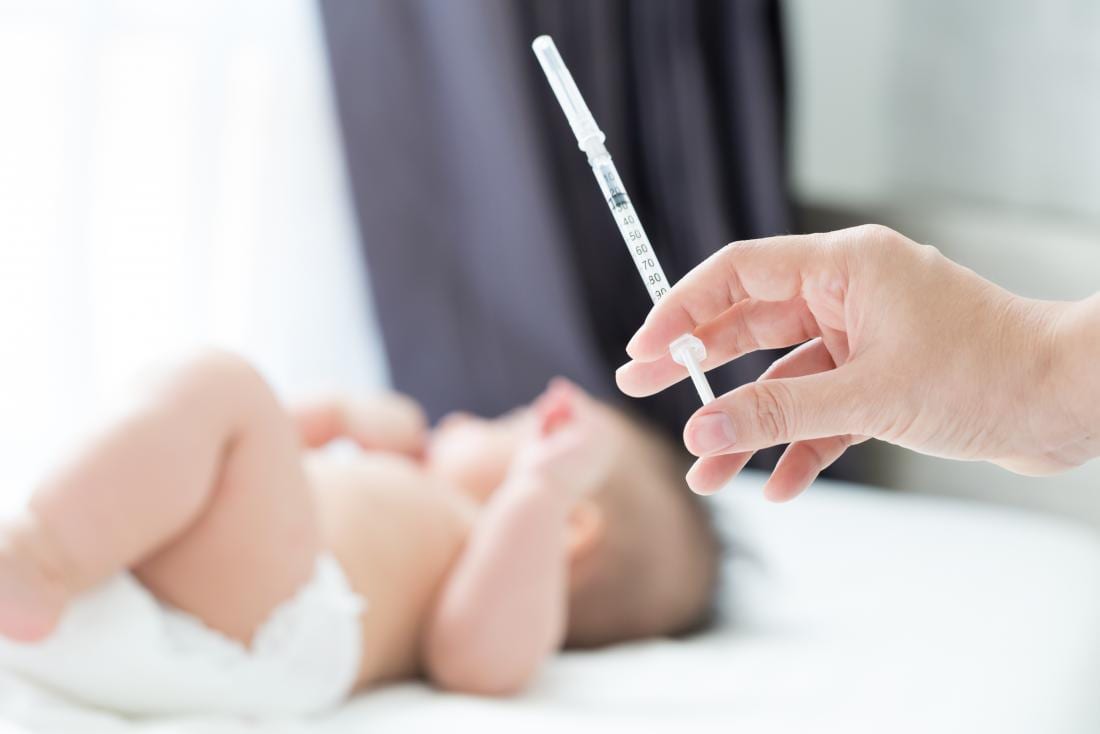 injection and a newborn baby