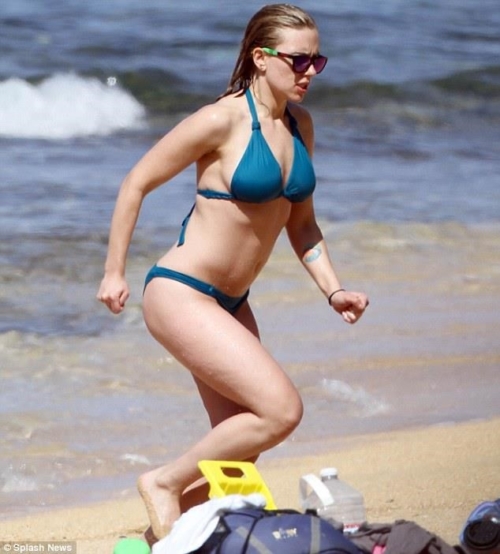 Scarlett Johansson frolicking on beach